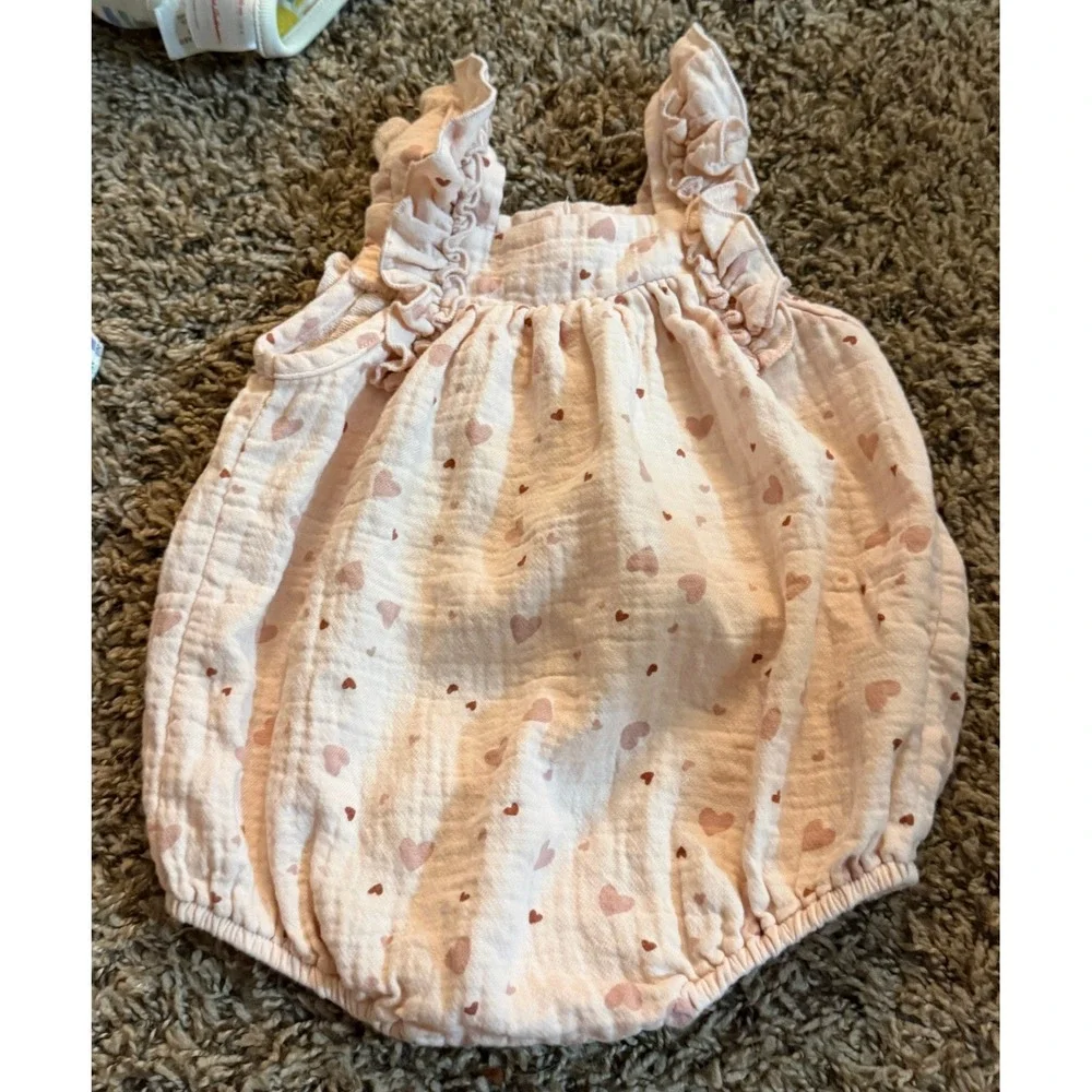 Quincey Mae-Pink A Sleeveless Pink all Over Heart Pattern Romper 6 months